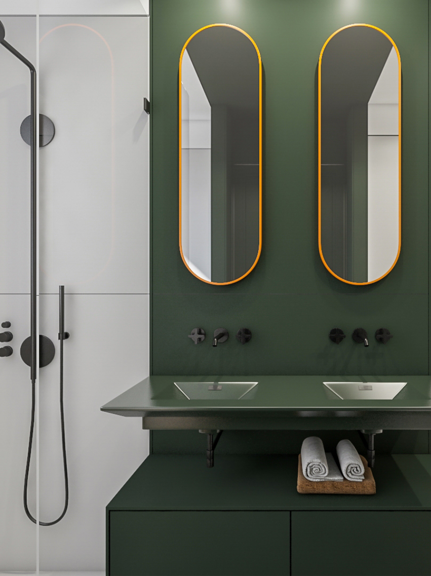 A modern green and gray bathroom featuring sleek mirrors with orange accents, a hallmark of ArchiBuilders' bathroom renovations in Brooklyn.