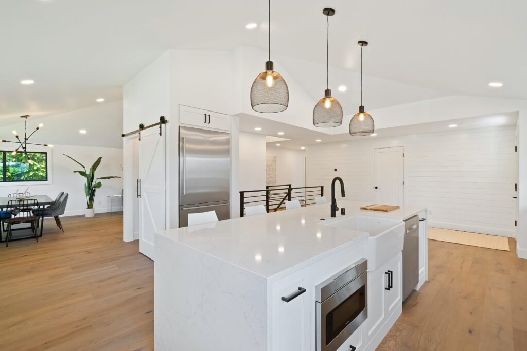 Sleek modern kitchen showcasing innovative design as an example of NYC renovation cost savings