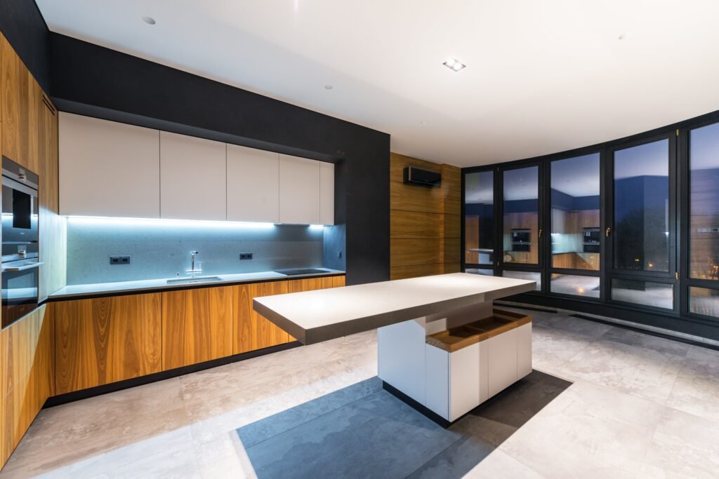 Modern kitchen remodel with sleek wooden finishes and under-cabinet lighting