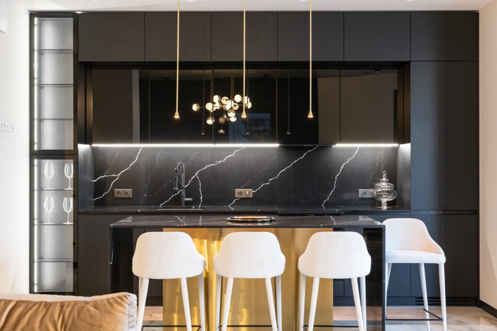 Modern kitchen interior with white cabinetry by a kitchen remodeling company